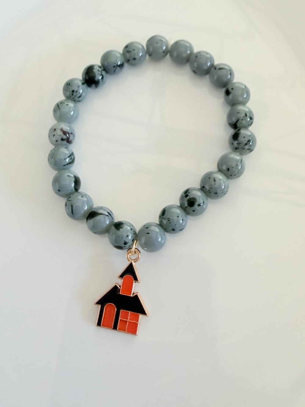 Halloween Grey Beaded Bracelet with Orange Haunted House Charm